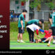 Physiotherapist assessing a kabaddi player's knee for ACL injury on field